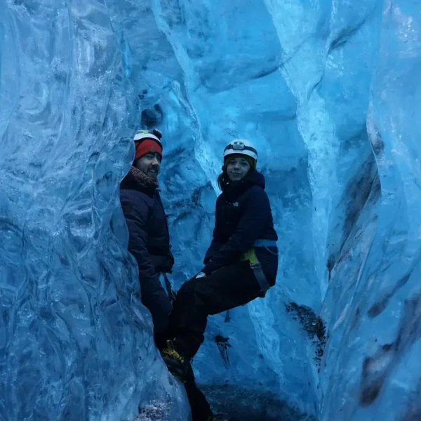 2 persons in a ice cave