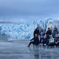 group in front of calving Jökulsarlón