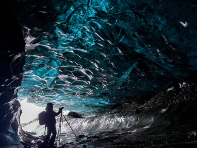 a photohgrapher working in the ice cave